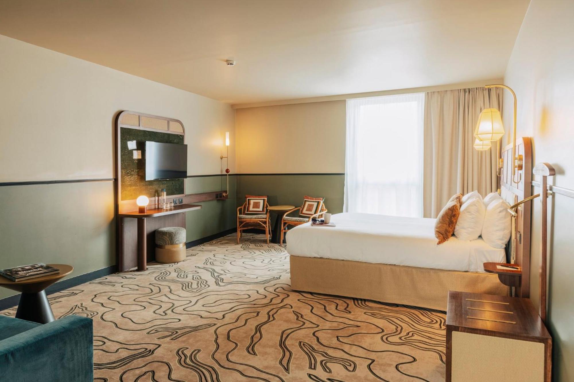 Voco Paris - Porte De Clichy By Ihg Екстериор снимка